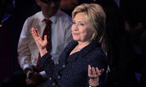 Hillary Clinton spreading her arms