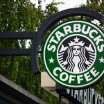 Caption: Photo of Starbucks coffee store sign