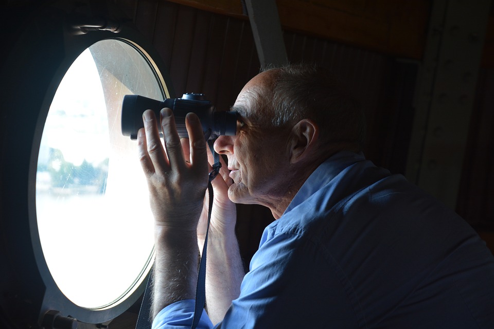 Figure looking out of airplane window representing strategic planning effectiveness